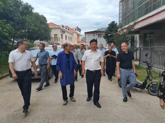 新化县政协调研组走访调研城步新化白溪移民(图1)